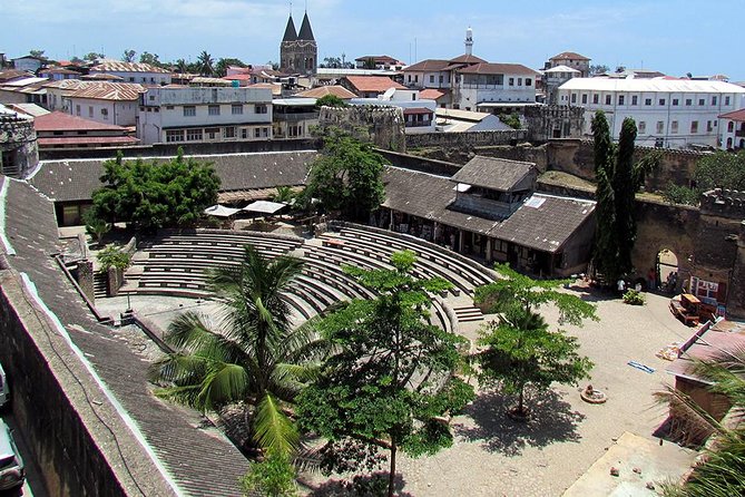 Stone Town Zanzibar 2026 — UNESCO coral stone lanes carved wooden doors waterfront